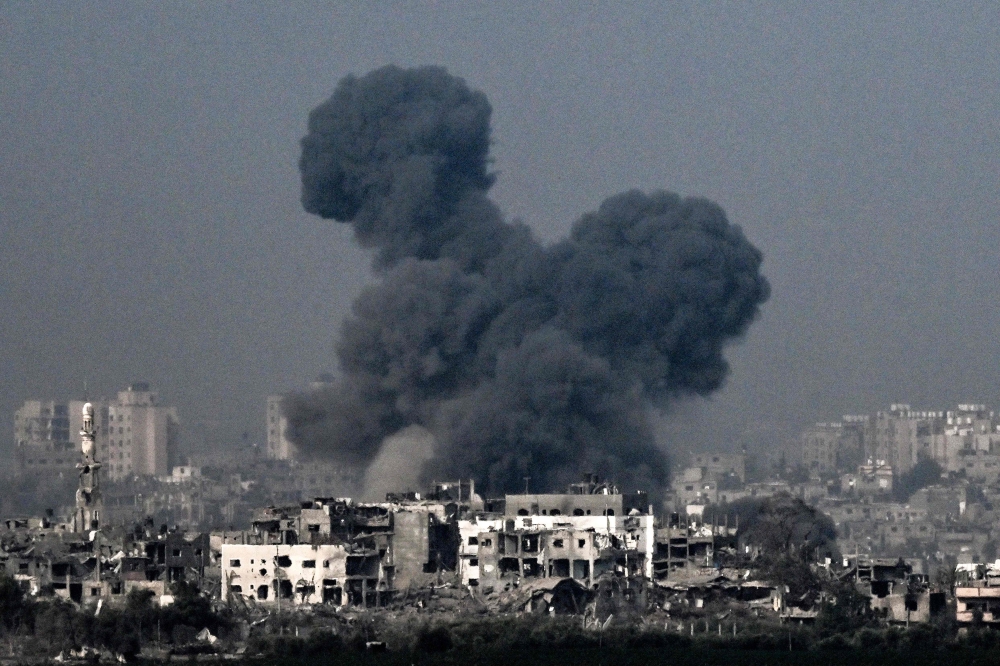 Smoke raising during an Israeli air strike in the northern Gaza Strip. Israeli air strikes destroyed hundreds of buildings in the Gaza Strip overnight
