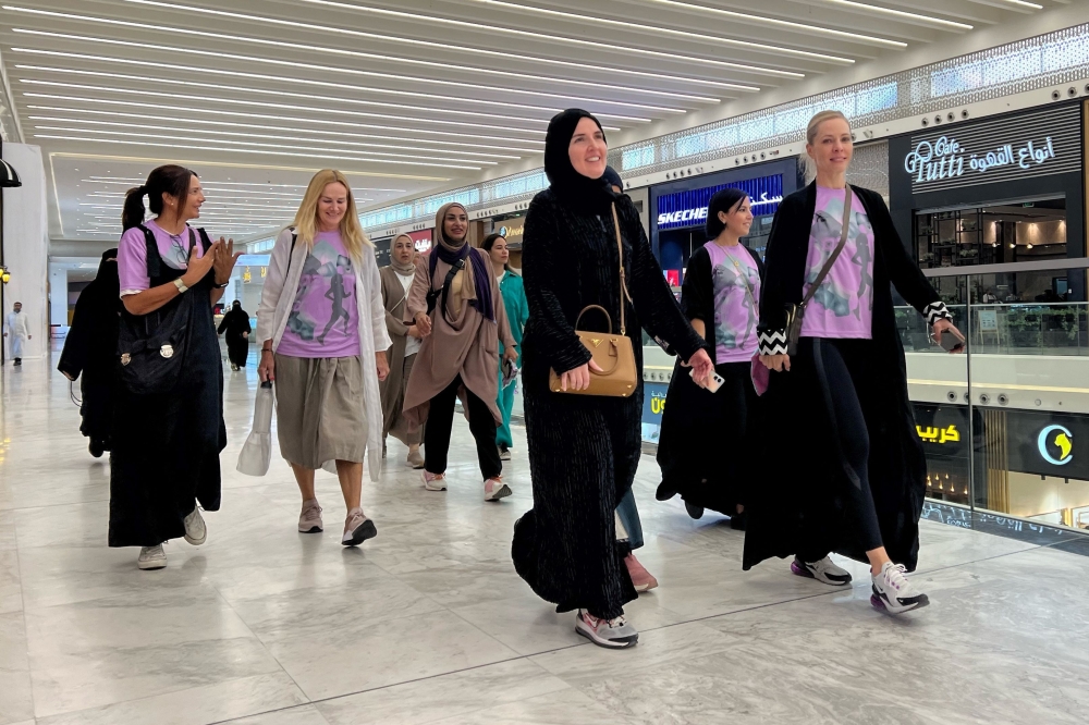 Saudi women exercise in a mall in Riyadh on October 15, 2023. Long popular in the United States, another car-centric country with an obesity problem, mall-walking is increasingly becoming a Saudi sport. 

