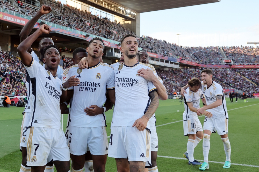 Real Madrid  team after scoring second goal during the Spanish league against FC Barcelona.—AFP

