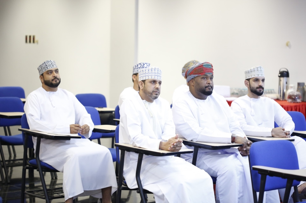 participants of the forum at Al Amal club  