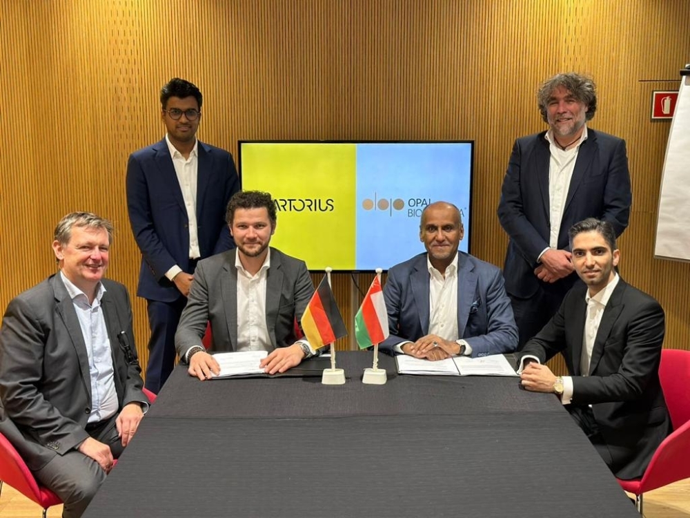 Opal Bio Pharma and Sartorius representatives pose for a photo during the signing ceremony.