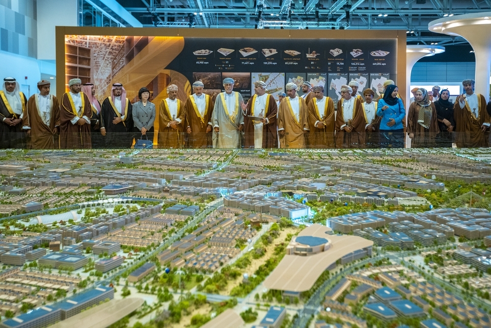 Special guests look into one of the exhibits at October Urban conference in Oman Convention and Exhibition Centre.