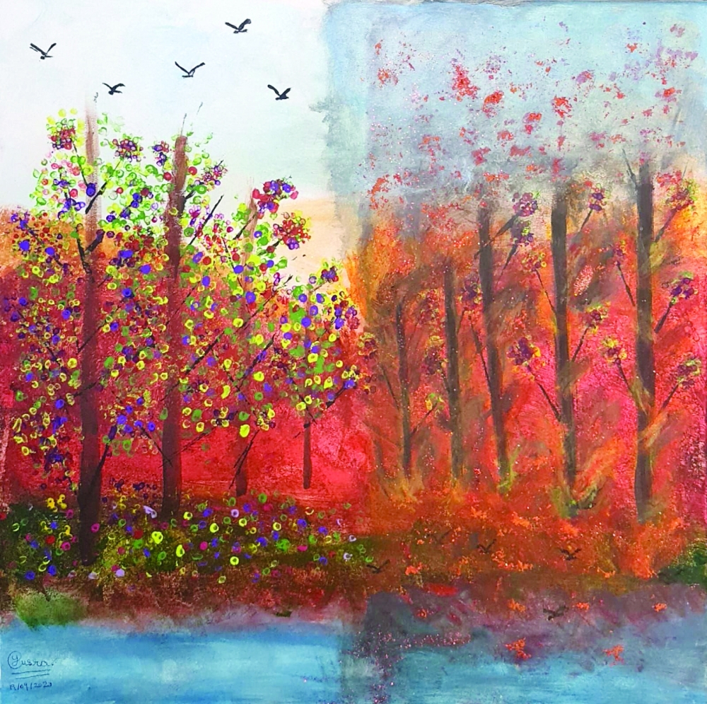 A student displays art at ASAS