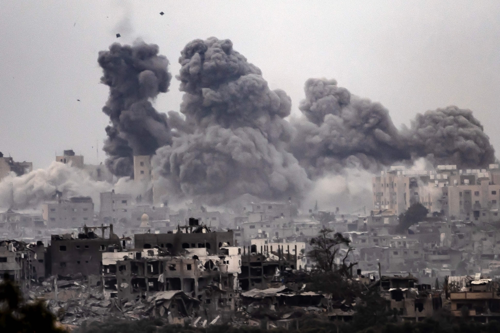 A picture shows smoke rising during Israeli bombardment of the Gaza Strip. — AFP 