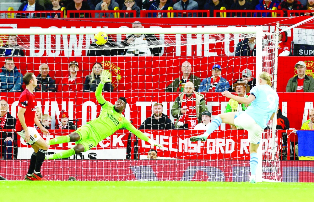 Manchester City's Erling Braut Haaland scores their second goal against Manchester United at Old Trafford. — Reuters