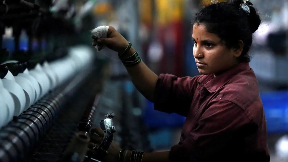A female employee works inside a garment factory in India, in this illustration photo. — Reuters