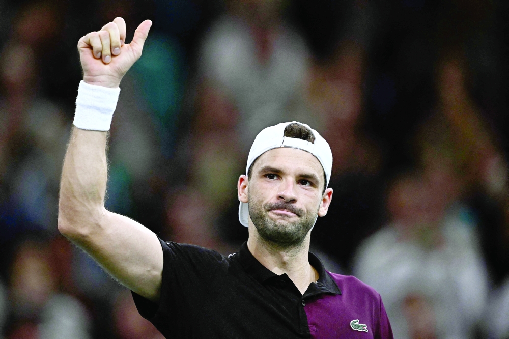 Bulgaria’s Grigor Dimitrov celebrates after beating Daniil Medvedev on day three of the Paris ATP Masters 1000 tournament at the Accor Arena in Paris on Wednesday. — AFP