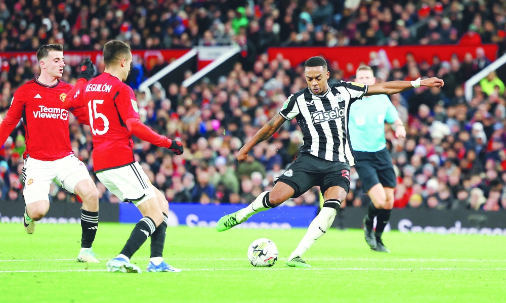 Newcastle United's Joe Willock scores their third goal at Old Trafford. -- Reuters