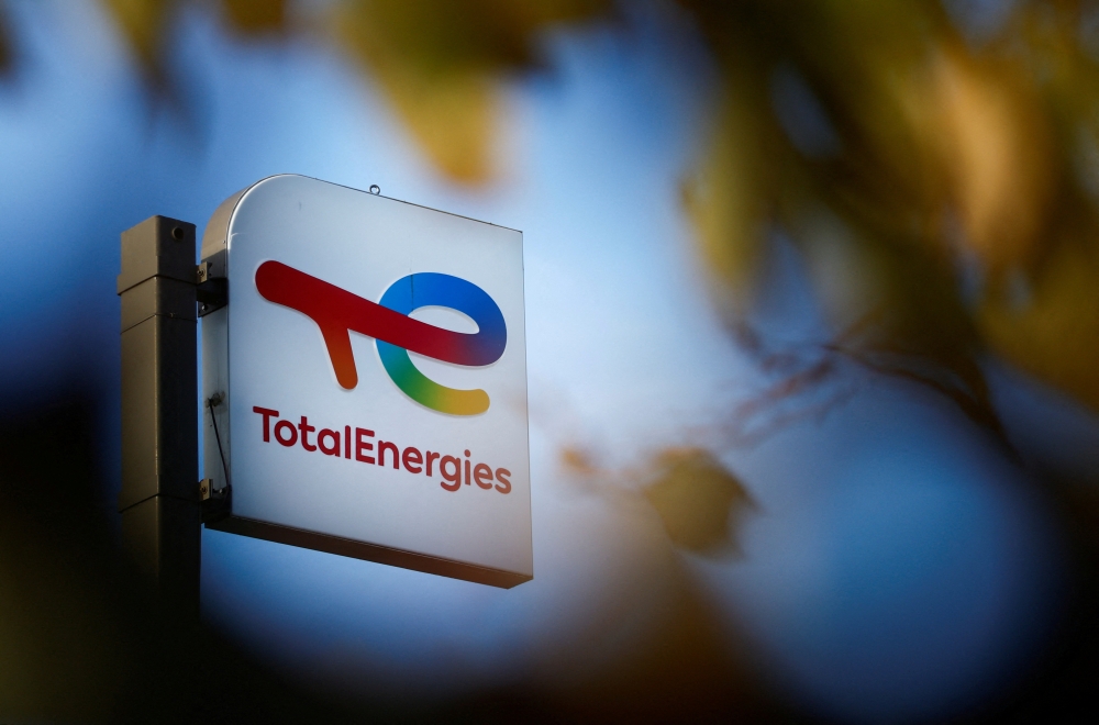 A sign with the logo of TotalEnergies in Bouguenais. - Reuters