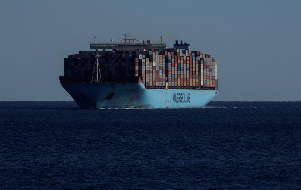 Containers are seen on the Maersk's Triple-E giant container ship Majestic Maersk as it sails in the Strait of Gibraltar towards the port of Algeciras