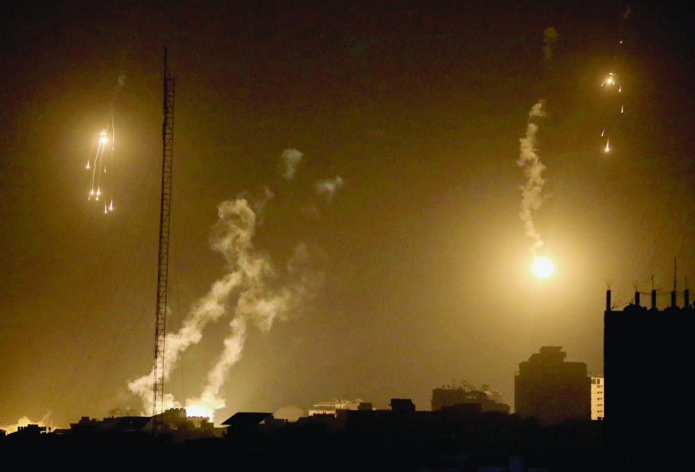 Smoke rises during an Israeli airstrike in Gaza. — Reuters 