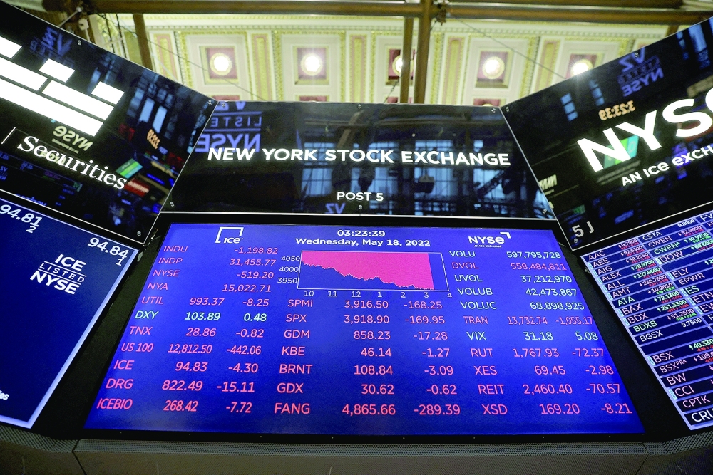 A monitor displays stock market information on NYSE in Manhattan, New York City_Reuters