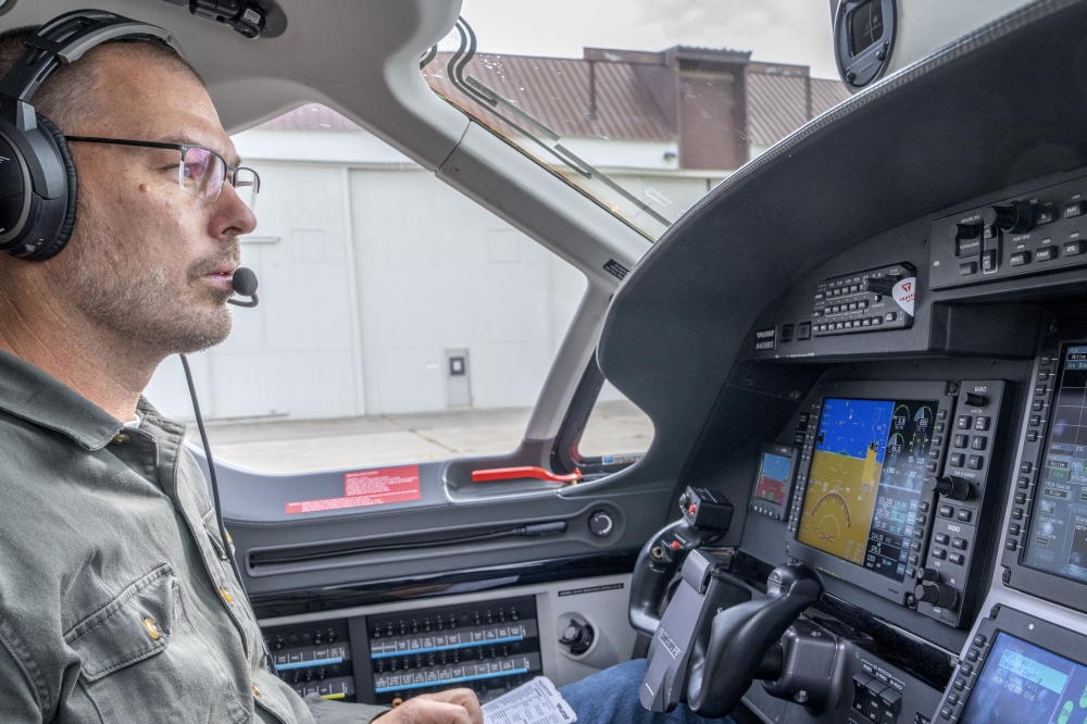 Kyle Clark, the founder and chief executive of Beta, in a conventional plane flying between the companys facilities in New York and Vermont, in Burlington. 