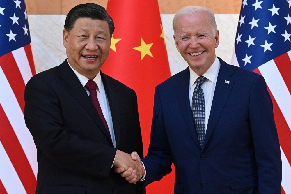 US President Joe Biden (R) and China's President Xi Jinping. — Reuters file photo 