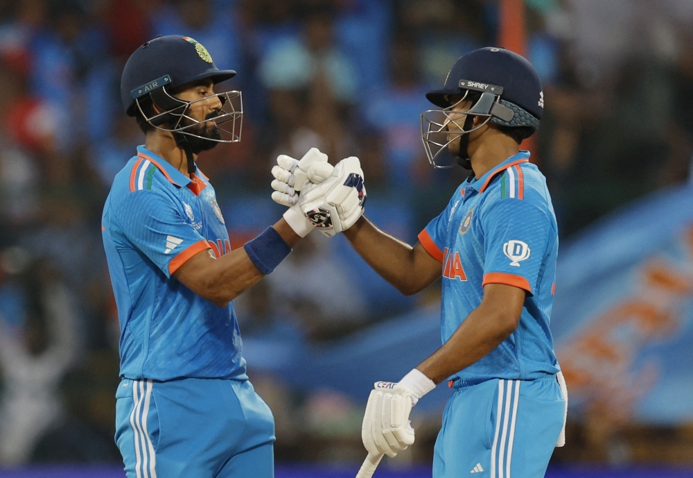 KL Rahul celebrates with Shreyas Iyer after reaching his century. — Reuters