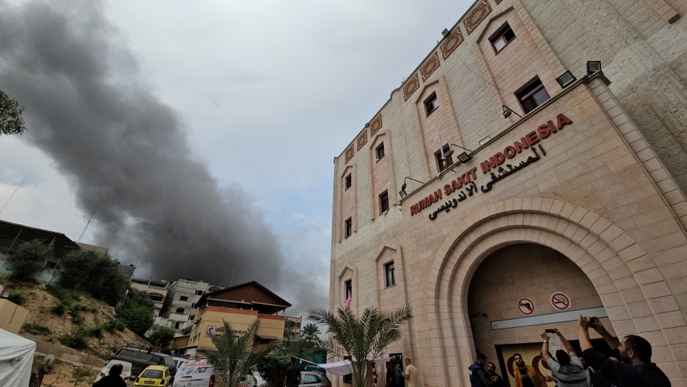 Smoke rises following an Israeli strike near the Indonesian Hospital that ran out of fuel and electricity, in the northern Gaza Strip. — Reuters 