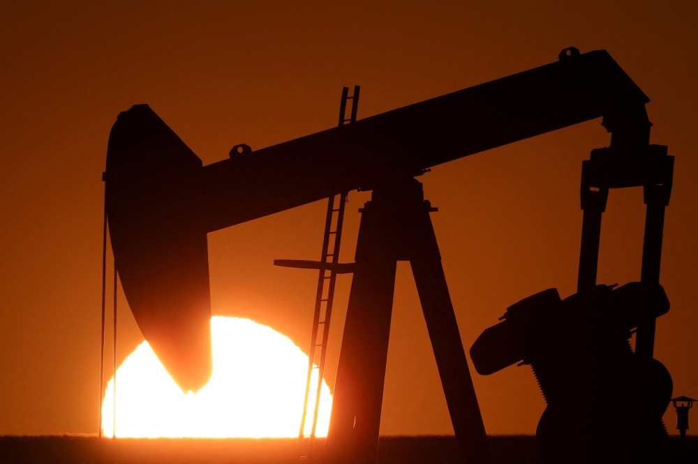 An oil pump of IPC Petroleum France is seen at sunset outside Soudron__Reuters 