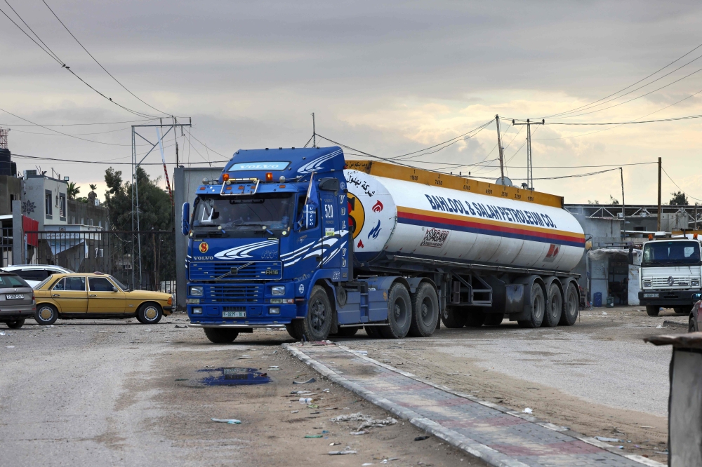 A truck carrying fuel crosses into Rafah in the southern Gaza Strip. — AFP