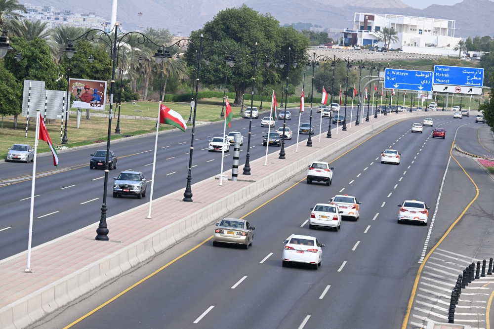 Oman national flags flutter in Qurum. Photo by Khalfan al Ruzaiki