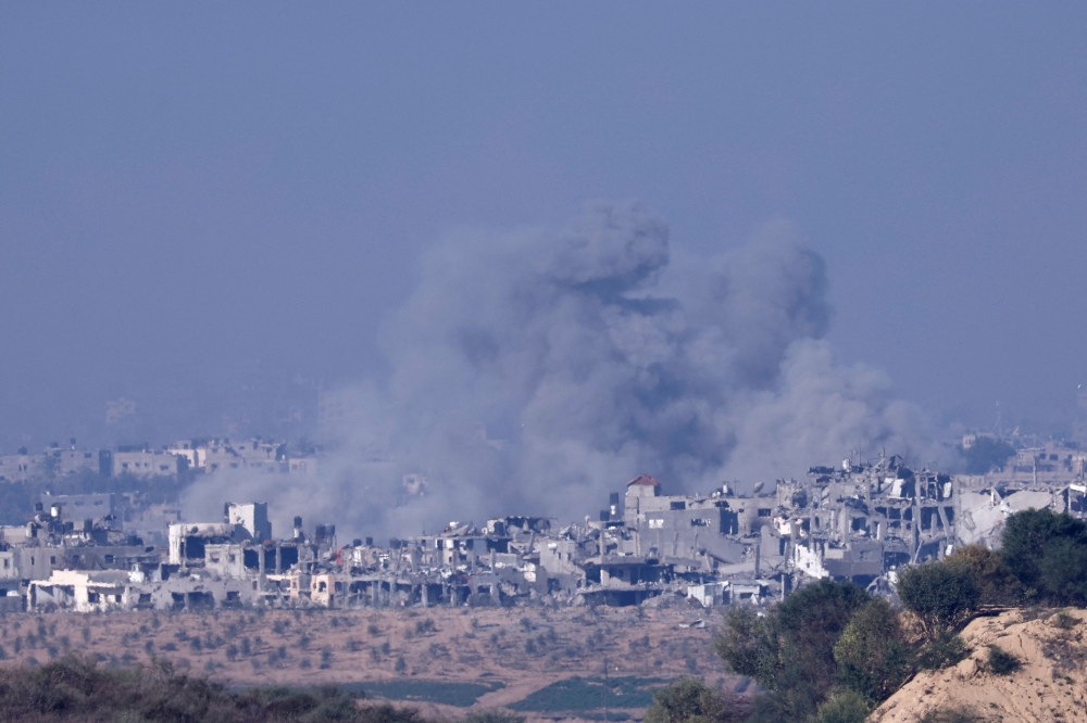A picture shows smoke billowing during Israeli bombardment on the Palestinian enclave. — AFP