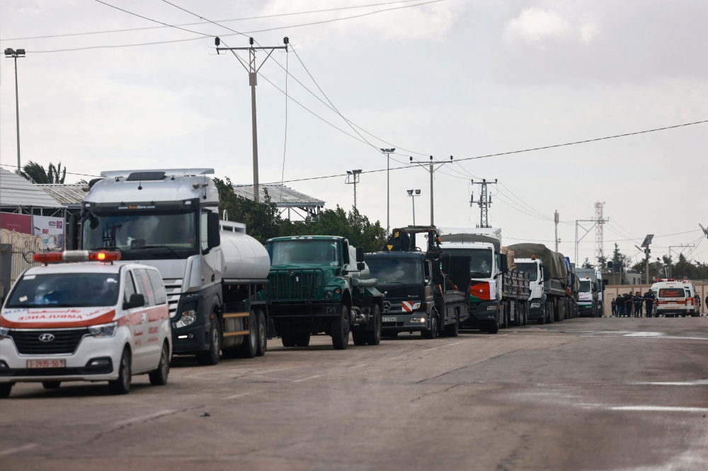 An aid convoy enters the Gaza Strip through the Rafah crossing with Egypt. — AFP 