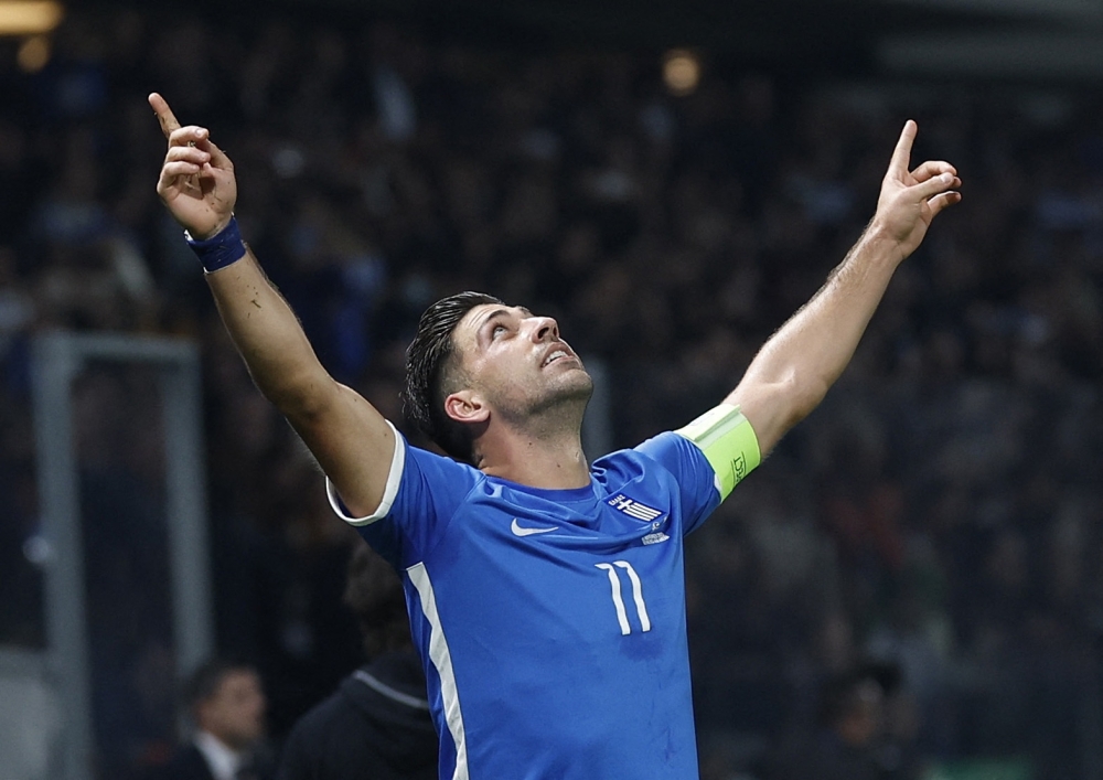 Soccer Football - UEFA Euro 2024 qualifier - Group B - Greece v France - OPAP Arena, Athens, Greece - November 21, 2023 Greece's Anastasios Bakasetas celebrates scoring their first goal REUTERS/Louisa Gouliamaki
