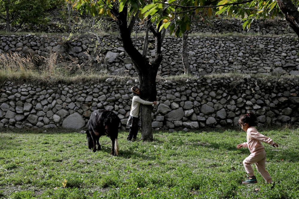 The Wider Image: Mountain villages fight for future as melting glaciers threaten floods