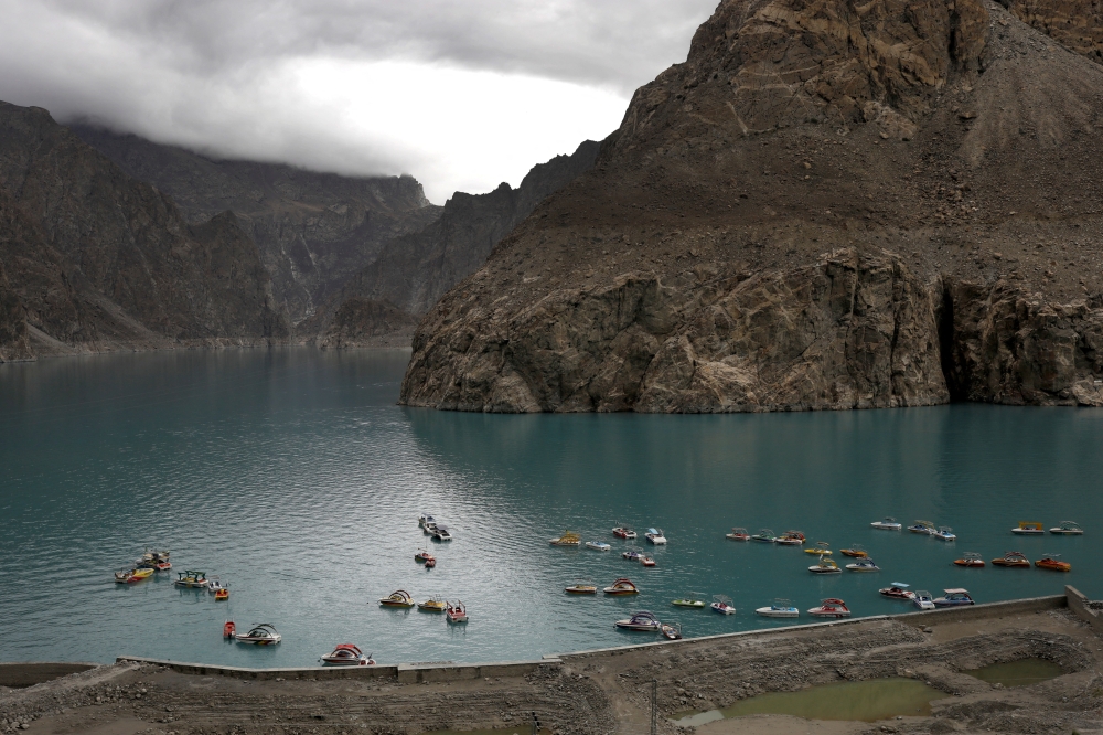 Boats gather on Attabad lake, which was formed due to a landslide in Attabad, in the Karakoram mountain range in the Gilgit-Baltistan region of Pakistan