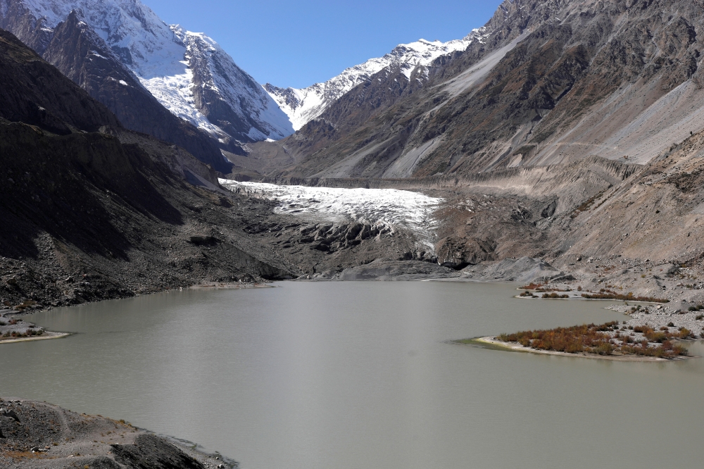 The Wider Image: Mountain villages fight for future as melting glaciers threaten floods