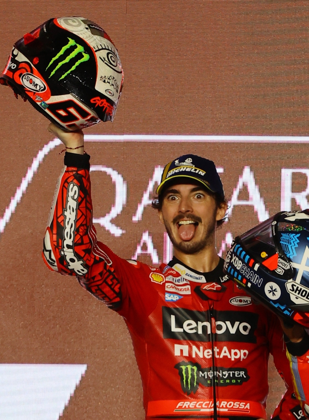 Grand Prix of Qatar - Lusail International Circuit, Lusail, Qatar - November 19, 2023 Ducati Lenovo Team's Francesco Bagnaia celebrates on the podium after finishing second place in the Grand Prix of Qatar REUTERS/Ibraheem Al Omari
