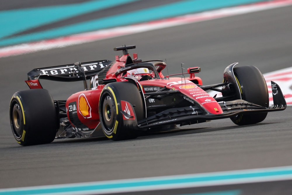 Ferrari's Monegasque driver Charles Leclerc drives during the second practice session for the Abu Dhabi Formula One Grand Prix at the Yas Marina Circuit in the Emirati city on November 24, 2023. (Photo by Giuseppe CACACE / AFP)

