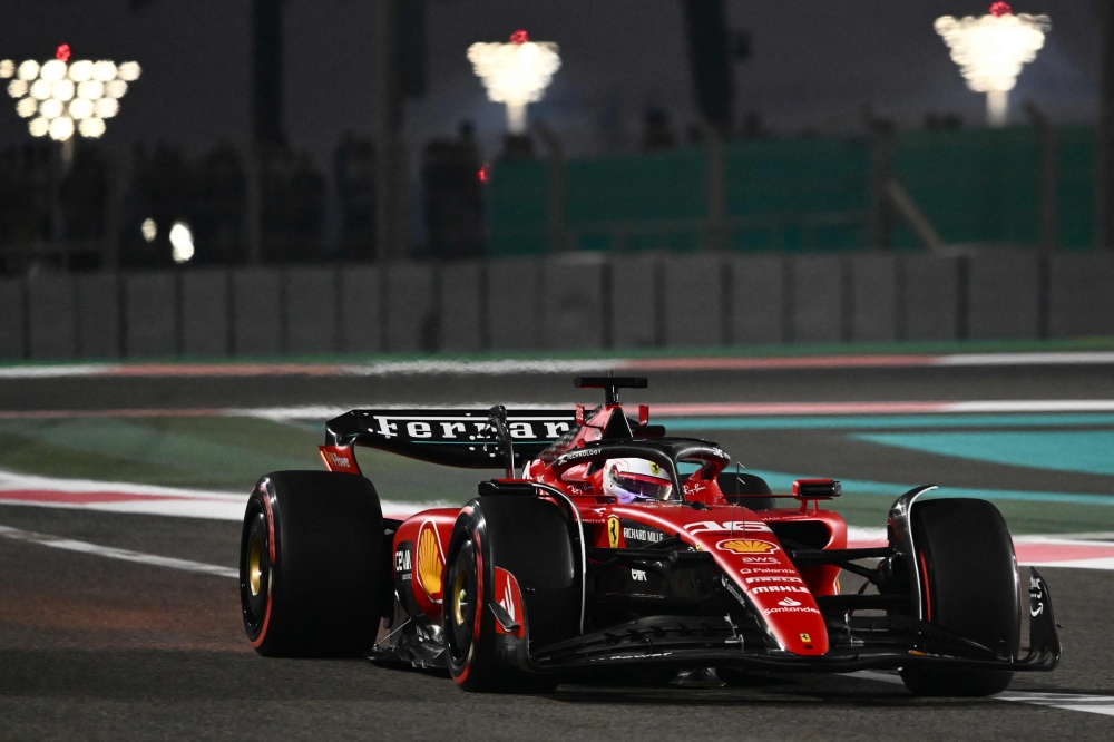 Ferrari's Monegasque driver Charles Leclerc drives during the second practice session for the Abu Dhabi Formula One Grand Prix at the Yas Marina Circuit in the Emirati city on November 24, 2023. (Photo by Jewel SAMAD / AFP)

