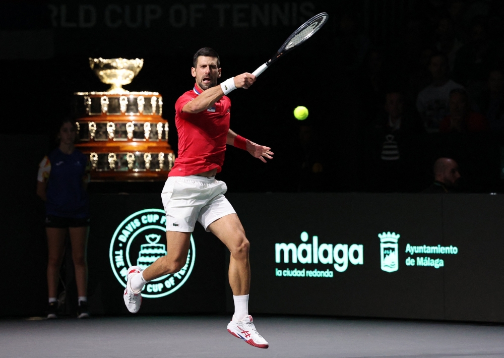 Tennis - Davis Cup - Finals - Serbia v Britain - Palacio de deportes Martin Carpena, Malaga, Spain - November 23, 2023 Serbia's Novak Djokovic in action during his match in the quarter final against Britain's Cameron Norrie REUTERS/Violeta Santos Moura

