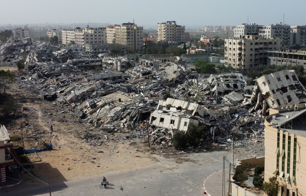 Residential buildings, destroyed in Israeli strikes, lie in ruin, in southern Gaza City. — Reuters 