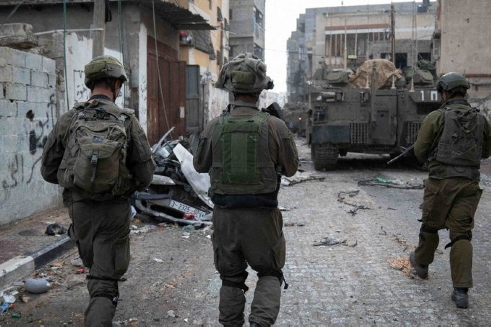 Israel's military operates in the Gaza Strip during a temporary truce. — Reuters 