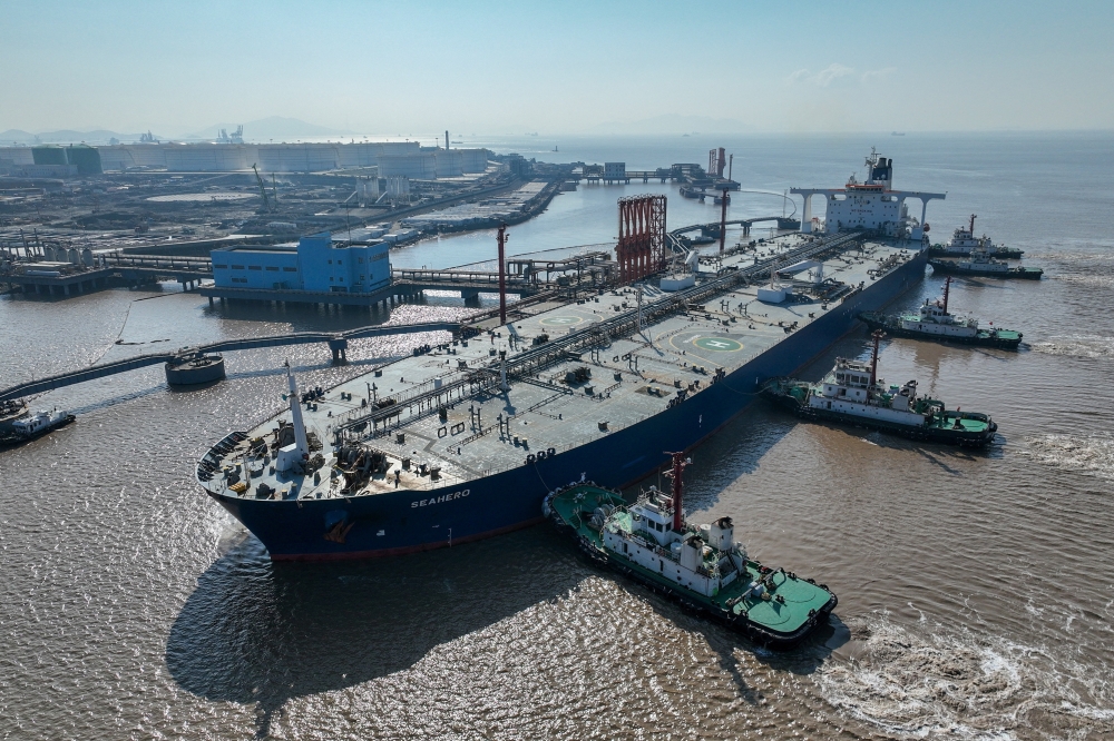 An aerial view shows a crude oil tanker at an oil terminal off Waidiao island in Zhoushan, Zhejiang province, China January 4, 2023. China Daily via REUTERS