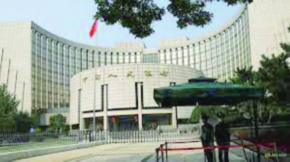 Paramilitary police officers stand guard in front of the headquarters of the People's Bank of China, the central bank (PBOC), in Beijing, China September 30, 2022. REUTERS
