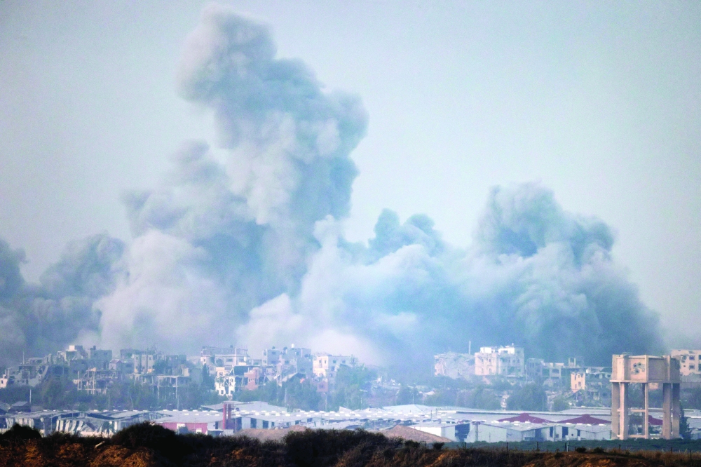 This picture shows smoke billowing over the Palestinian enclave during Israeli bombardment. — AFP 