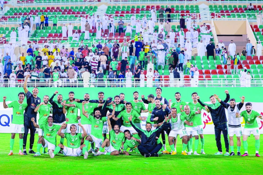 Al Nahda team celebrating after the wining 