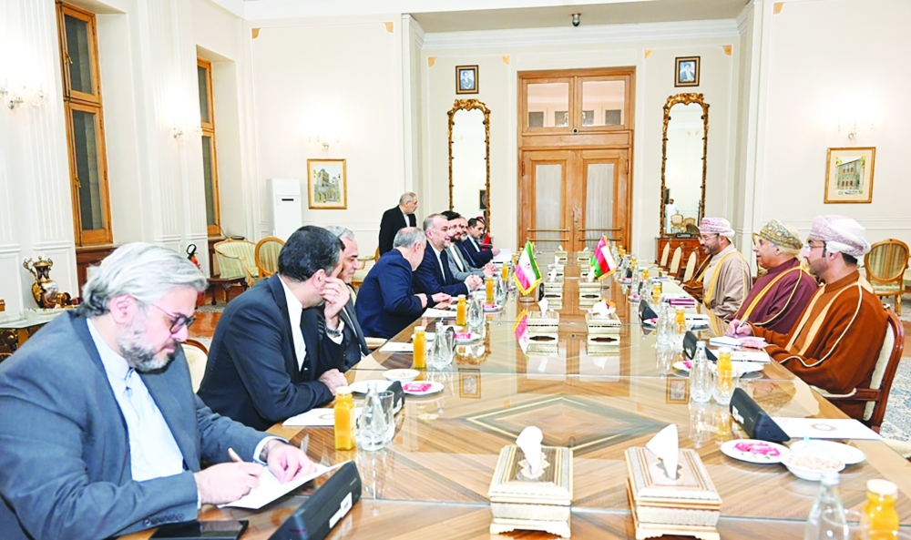 Sayyid Badr bin Hamad al Busaidy, Dr Hossein Amir Abdollahian, and other officials in a meeting in Tehran on Monday. — ONA
