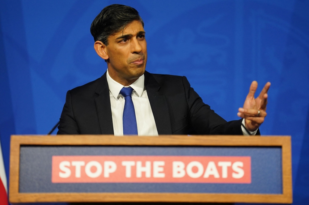 Britain's Prime Minister Rishi Sunak hosts a press conference inside the Downing Street Briefing Room, in central London. - AFP
