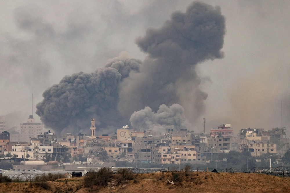 Smoke billowing during Israeli bombardment on Gaza amid continuing battles between Israel and Hamas. - AFP


