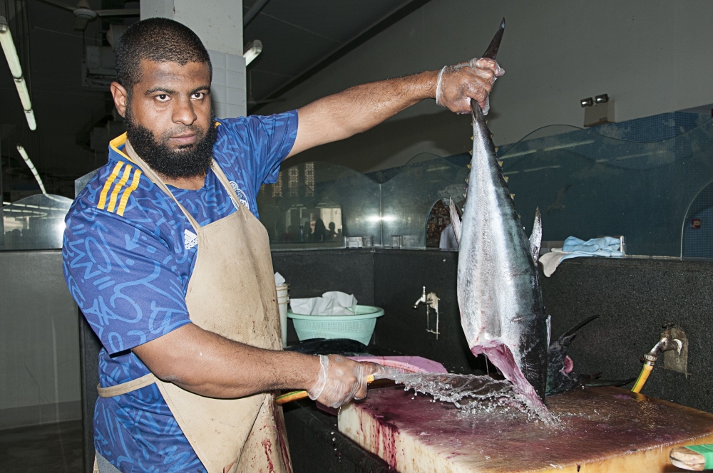 The service of cleaning and cutting fish in Omani markets is known locally as ‘Al Taqmeet’