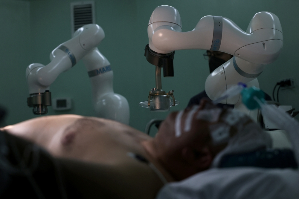 New magnetic surgical robot arms debut at a public hospital, in Santiago. — Reuters