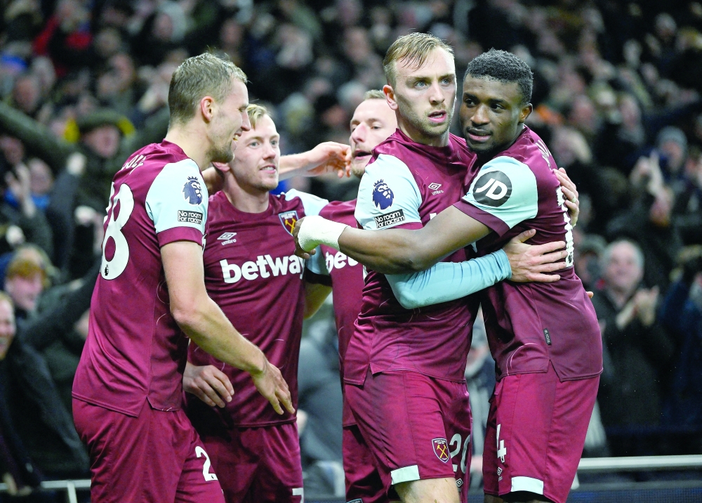 West Ham United's Jarrod Bowen celebrates scoring their first goal with teammates REUTERS