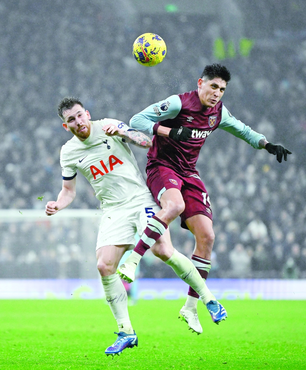 Tottenham Hotspur's Pierre-Emile Hojbjerg in action with West Ham United's Edson Alvarez REUTERS