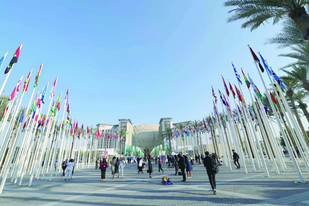 People visit the venue housing the United Nations climate summit in Dubai. - AFP


