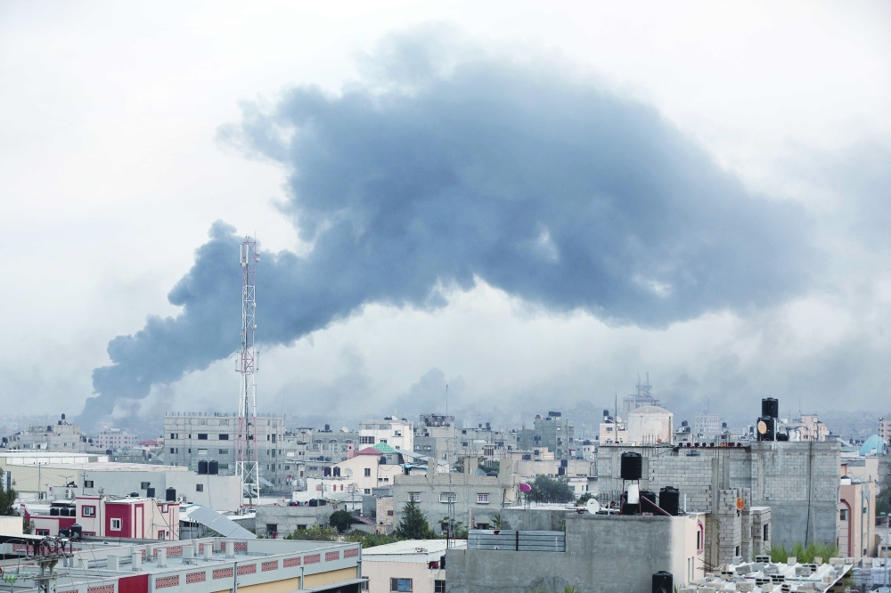 Smoke rises after Israeli strikes in Khan Younis in the southern Gaza Strip. - Reuters

