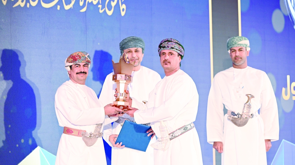 Dr Abdullah al Harrasi, Minister of Information crowned the first trophy to Salalah Club