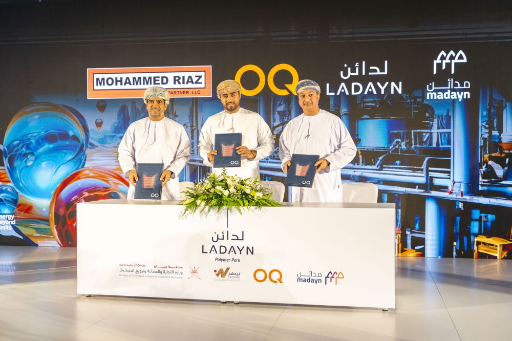 Hilal Al Kharusi signing an investment agreement with one of the partners

